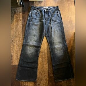 Buckle Men's Tyler Bootcut Jeans in Dark Blue Wash